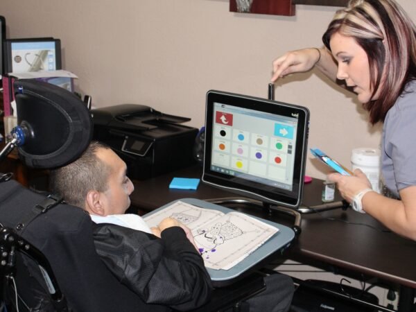 Building Bridges Speech Therapist in Frisco TX working with special needs client