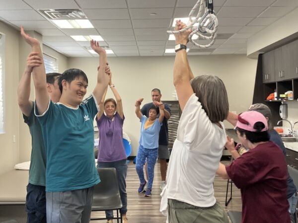 Building Bridges Through Communication Adaptive Movement Class exercising in Frisco TX
